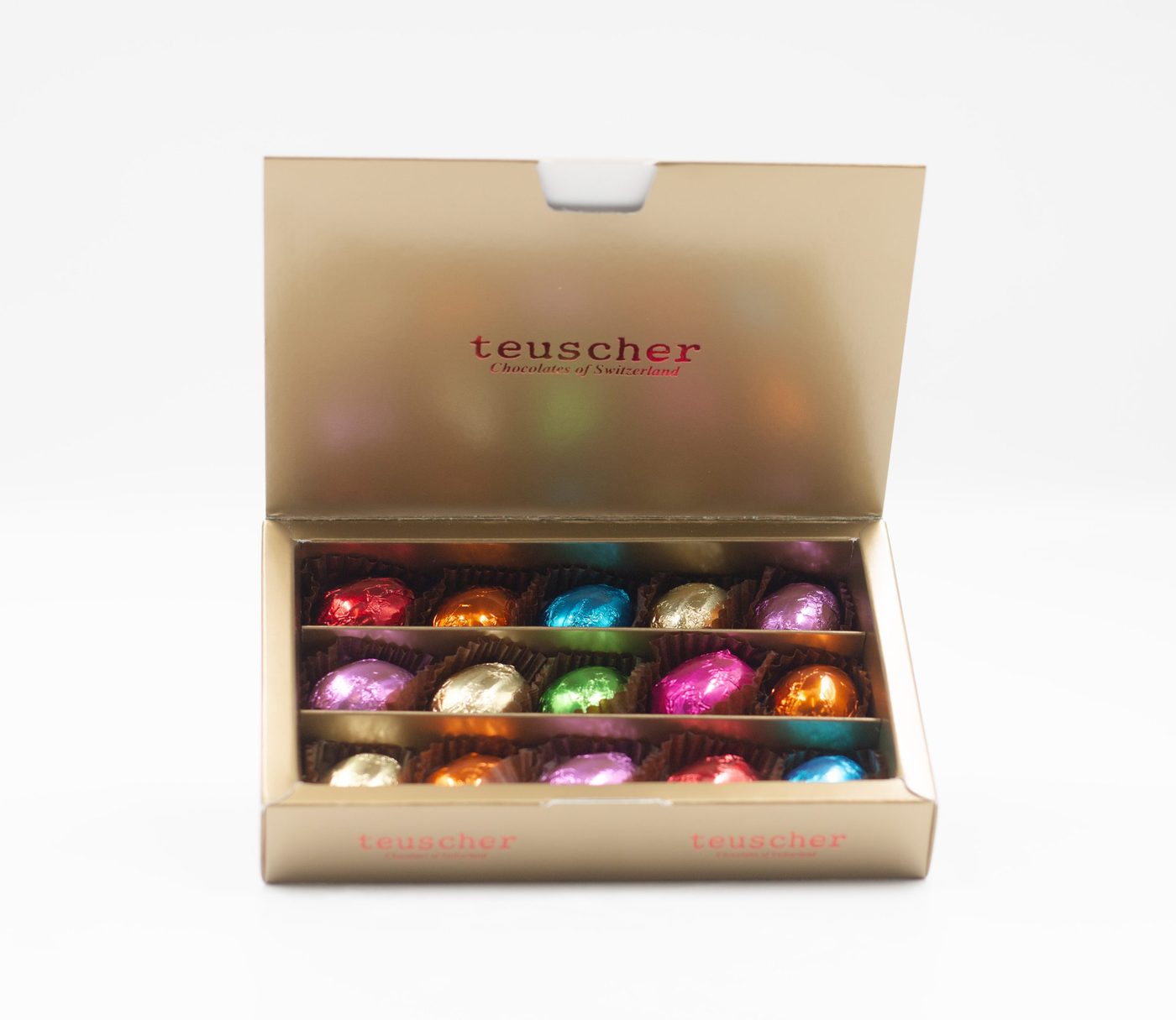 An open box of assorted pralines and truffles